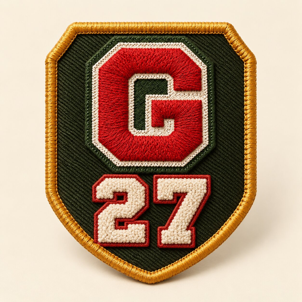 Patch escudo bordado com o G vermelho e o 27 em numeral de jaqueta, borda mostarda